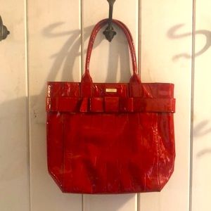 A classic with red Patent leather and bow!